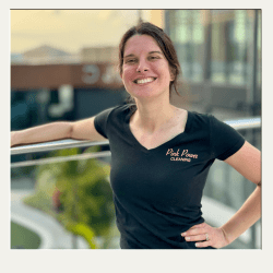 Tara Trusted Cleaning & Pest Control Team Leader Portrait – Outdoor Service in Troy / Springboro OH Team leader smiling outdoors in service uniform during cleaning and pest control visit in Troy OH.
